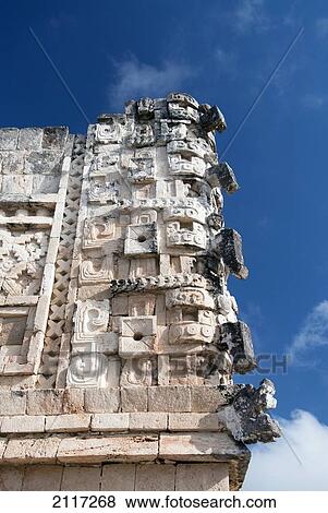 Stock Photo - Mexico, Yucatan, Uxmal, Cuadrangle de las Monjas (Nuns Quadrangle), the long nosed face of Chac (the Mayan rain god). Fotosearch