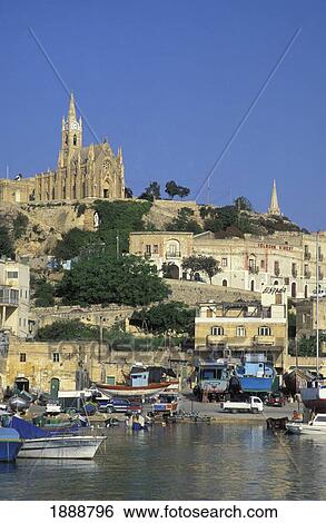 Stock Photograph - Mgarr Harbour And Lourdes Chapel. Fotosearch