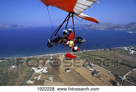 Stock Photo - Microlight Paragliding. Fotosearch