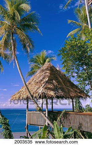 Stock Photography - Micronesia, Caroline Islands, Pohnpei, View Of Hut Overlooking Ocean At Village Resort. Fotosearch