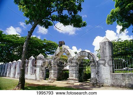 Stock Image - Micronesia, Guam, Agana, Plaza De Espana, View Of Gateway From Exterior. Fotosearch