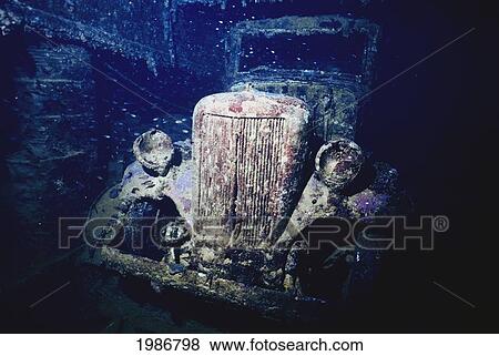 Stock Photo - Micronesia, Japanese flatbed truck insie forward hold of ship; Truk Lagoon, World War II shipwreck Shinkoku Maru. Fotosearch