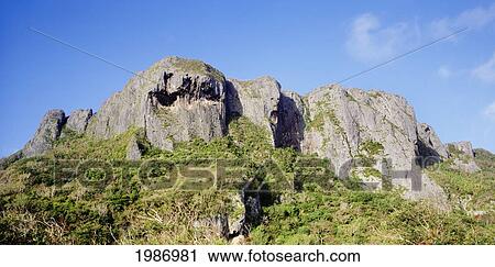 Stock Image - Micronesia, Mariana Islands, Saipan, Screaming Face in rock; Suicide Cliff. Fotosearch
