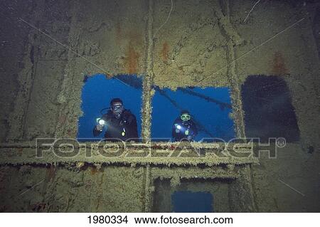 Micronesia, Palua, Scuba Divers Explore A Wreck. View Large Photo Image Picture - Micronesia, Palua, Scuba Divers Explore A Wreck.. Fotosearch