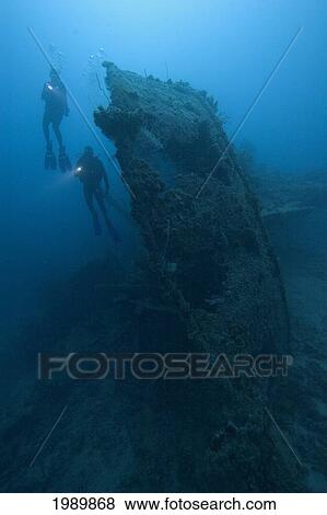 Micronesia, Palua, Scuba Divers Explore A Wreck. View Large Photo Image Stock Photo - Micronesia, Palua, Scuba Divers Explore A Wreck.. Fotosearch