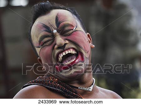 Stock Photo - Midget in a Barong dance performance in Batubulan, Bali, Indonesia. Fotosearch