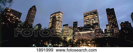 Stock Photo - Midtown Manhattan Viewed From South Central Park At Dusk. Fotosearch