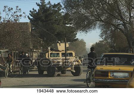 Stock Photo - Military Humvee On A Kabul Street,, Afghanistan. Fotosearch