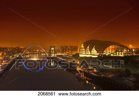 Millenium Bridge And The City Illuminated At Night; Newcastle Northumberland England View Large Photo Image Stock Image - Millenium Bridge And The City Illuminated At Night; Newcastle Northumberland England. Fotosearch