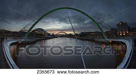 Stock Image - Millenium Bridge Over The River Tyne; Newcastle Upon Tyne, Tyne And Wear, England. Fotosearch