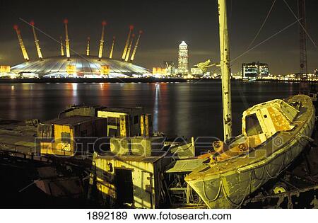 Stock Photo - Millenium Dome And Canary Wharf Tower. Fotosearch
