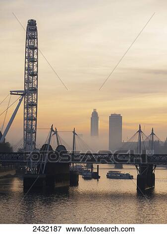Millenium Wheel at sunset; London, England View Large Photo Image Stock Photo - Millenium Wheel at sunset; London, England. Fotosearch