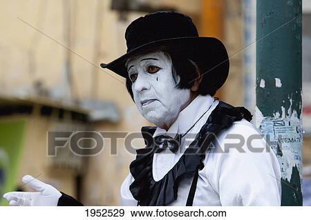 Stock Photo - Mime Walter Caliyaza performing on a street corner in Cochabamba, Bolivia. Fotosearch