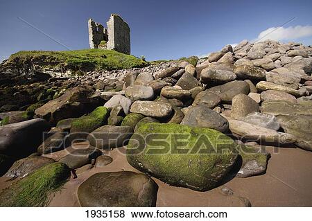 Minard Castle And Rocky Beach; Minard, County Kerry, Ireland View Large Photo Image Stock Photo - Minard Castle And Rocky Beach; Minard, County Kerry, Ireland. Fotosearch