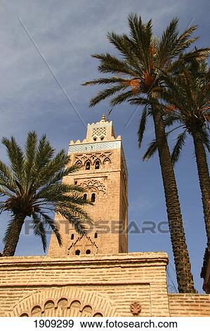 Minaret Of Koutoubia Mosque And Palm Tree, Marrakesh, Morocco View Large Photo Image Stock Photo - Minaret Of Koutoubia Mosque And Palm Tree, Marrakesh, Morocco. Fotosearch
