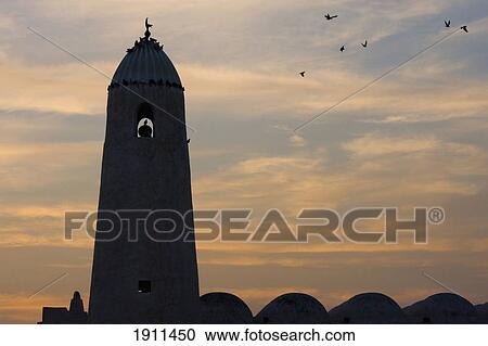 Stock Image - Minaret Of Qassim Mosque At Sunset, Doha, Qatar. Fotosearch