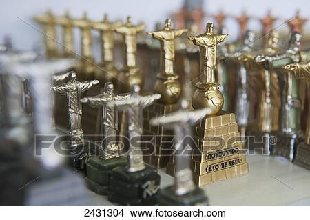 Miniature souvenir statues of Christ the Redeemer; Rio de Janeiro, Brazil View Large Photo Image Picture - Miniature souvenir statues of Christ the Redeemer; Rio de Janeiro, Brazil. Fotosearch