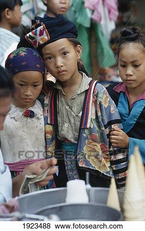 Stock Photo - Minority Girls In The Market. Fotosearch