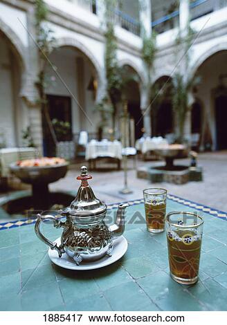 Mint Tea And Two Glasses In A Traditional Moroccan Courtyard View Large Photo Image Stock Photo - Mint Tea And Two Glasses In A Traditional Moroccan Courtyard. Fotosearch