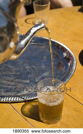 Mint Tea Pouring Into Glass View Large Photo Image Stock Photography - Mint Tea Pouring Into Glass. Fotosearch