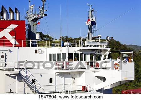Picture - Miraflores Locks, Panama Canal, Panama, Central America; Bridge Of Container Ship In Lock. Fotosearch