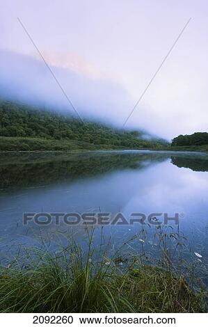 Stock Image - Mist On Jacques-Cartier River At Dawn In Jacques-Cartier National Park; Quebec Canada. Fotosearch