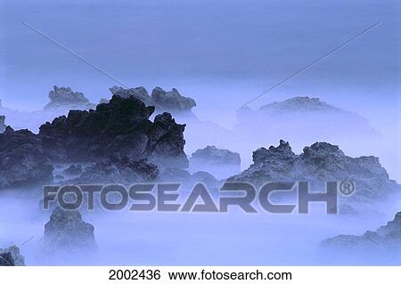 Misty Fog Layer Over Lava Rocks, Ocean Shoreline View Large Photo Image Stock Photograph - Misty Fog Layer Over Lava Rocks, Ocean Shoreline. Fotosearch