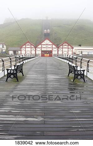 Stock Image - Misty View Of Victorian Pier; Redcar, North Yorkshire, England, Uk. Fotosearch