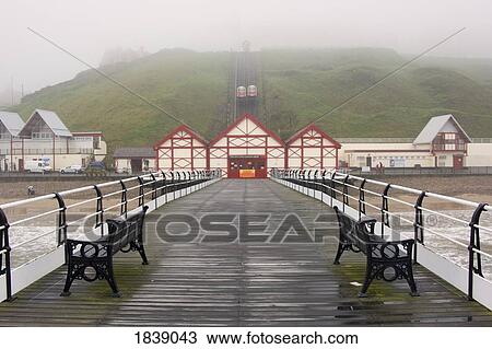 Stock Image - Misty View Of Victorian Pier; Redcar, North Yorkshire, England, Uk. Fotosearch