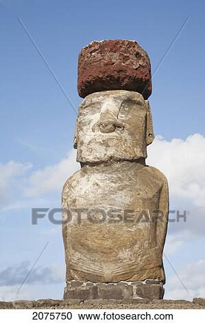 Stock Image - Moai With Pukau (Stone Hat), Restored By Archaeologist Claudio Cristino, At Ahu Tongariki At Dawn, Rapa Nui (Easter Island), Chile. Fotosearch