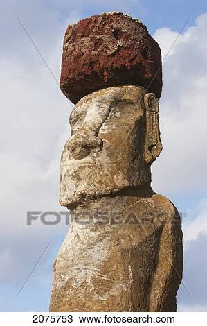 Stock Image - Moai With Pukau (Stone Hat), Restored By Archaeologist Claudio Cristino, At Ahu Tongariki At Dawn, Rapa Nui (Easter Island), Chile. Fotosearch