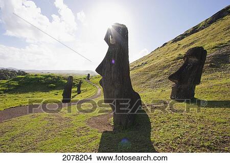 Moais By The Quarry On The Outer Slope Of The Rano Raraku Volcano, Rapa Nui (Easter Island), Chile View Large Photo Image Picture - Moais By The Quarry On The Outer Slope Of The Rano Raraku Volcano, Rapa Nui (Easter Island), Chile. Fotosearch