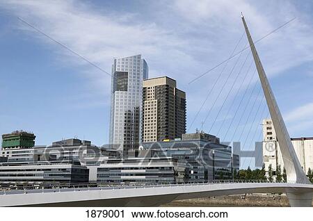 Stock Image - Modern Bridge And Buildings In Puerto Madero District. Fotosearch