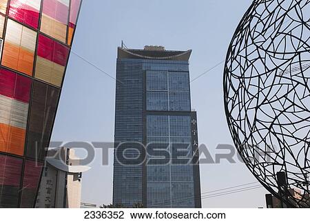 Modern Buildings And A Sculpture In Sanlitun Village; Beijing, China View Large Photo Image Stock Image - Modern Buildings And A Sculpture In Sanlitun Village; Beijing, China. Fotosearch