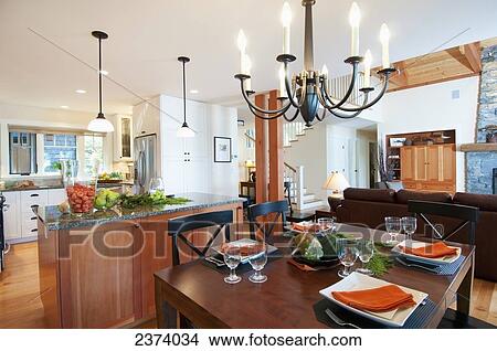 Modern Kitchen And Dining Area In West Coast Home; Mayne Island, British Columbia, Canada View Large Photo Image Picture - Modern Kitchen And Dining Area In West Coast Home; Mayne Island, British Columbia, Canada. Fotosearch