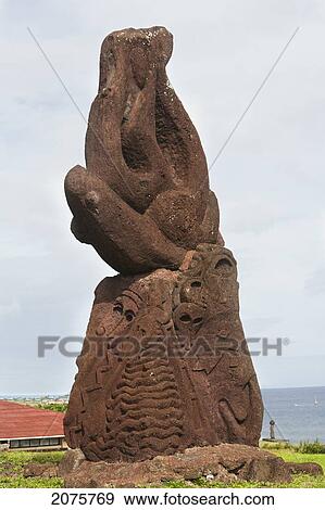 Modern Rapa Nui Sculpture In Front Of The Padre Sebasti View Large Photo Image Stock Photo - Modern Rapa Nui Sculpture In Front Of The Padre Sebasti. Fotosearch