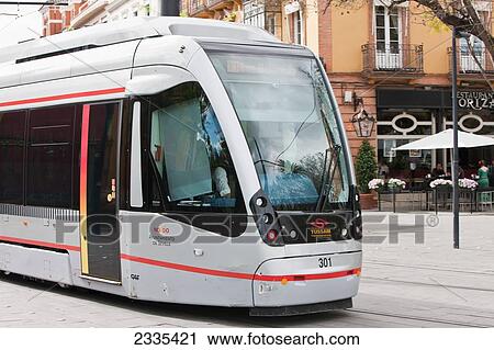 Stock Image - Modern Tram; Seville, Andalucia, Spain, Europe. Fotosearch