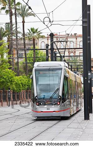 Stock Image - Modern Tram; Seville, Andalucia, Spain, Europe. Fotosearch