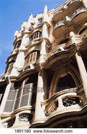 Stock Image - Modernista Building Facade, Low Angle View. Fotosearch