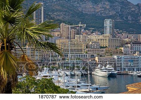 Stock Photo - Monaco; A View Of The City Along The Water And The Harbor. Fotosearch