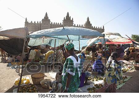Monday Market with the Great Mosque in the background at Djenne, Mali View Large Photo Image Stock Image - Monday Market with the Great Mosque in the background at Djenne, Mali. Fotosearch
