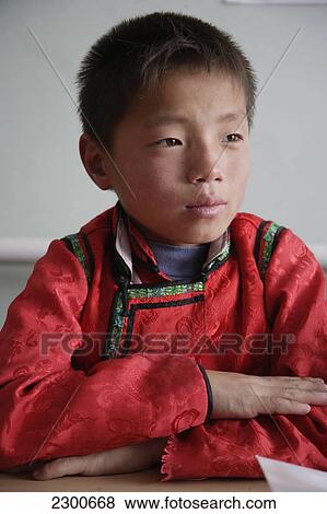 Stock Photo - Mongolia, A School And Home For Orphans And Abandoned Children; Ulaan Baatar, Child In Class At Lotus Centre. Fotosearch