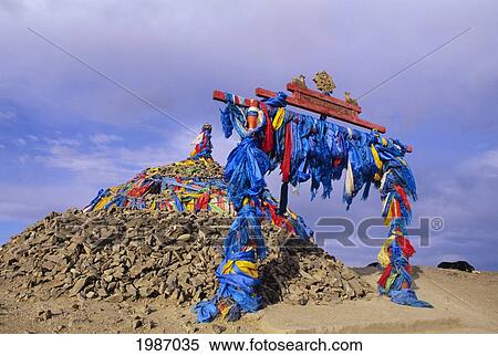Stock Photography - Mongolia, Ceremonial Ovoo Rocks and ribbons; Ulaanbaatar. Fotosearch