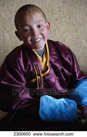 Stock Image - Mongolia, Erdene Zuu Monastery; Kharkhorin, Student Lama In Classroom At School For Lamas. Fotosearch