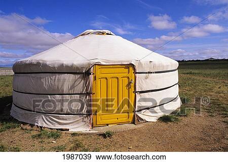 Mongolia, Traditional nomadic home with yellow door on flat grassy countryside; Ger Ranch View Large Photo Image Stock Photo - Mongolia, Traditional nomadic home with yellow door on flat grassy countryside; Ger Ranch. Fotosearch