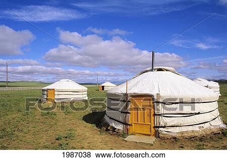 Mongolia, Traditional nomadic homes on flat grassy countryside; Ger Ranch View Large Photo Image Stock Photo - Mongolia, Traditional nomadic homes on flat grassy countryside; Ger Ranch. Fotosearch