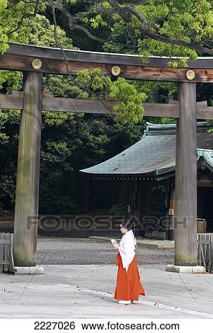 Stock Photograph - Monk At The Meiji-Jingu Shinto Shrine, Tokyo, Japan - Copyright Mark Thomas/Axiom. Fotosearch