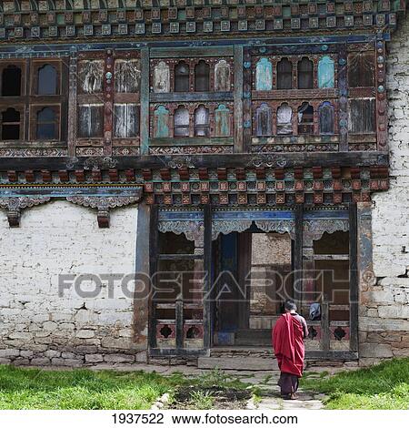 Monk Entering Wangdichholing Palace; Bumthang District Bhutan View Large Photo Image Stock Image - Monk Entering Wangdichholing Palace; Bumthang District Bhutan. Fotosearch