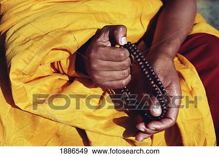 Monk Holding Prayer Beads View Large Photo Image Stock Photo - Monk Holding Prayer Beads. Fotosearch