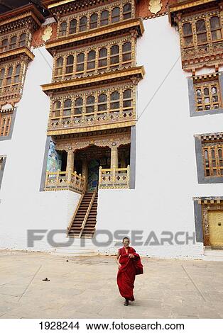 Picture - Monk In Front Of Dzong, Punakha, Bhutan. Fotosearch